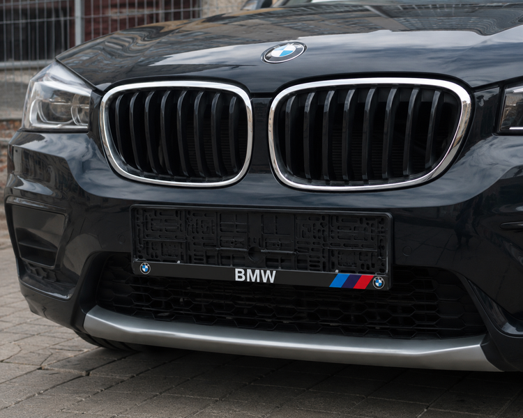 Рамка номерного знака BMW пластиковая Poputchik (1шт) 24-130-IS фото